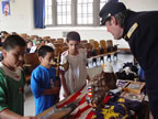 Holding the top of a Civil War flag.  A part of American History.(84kb)