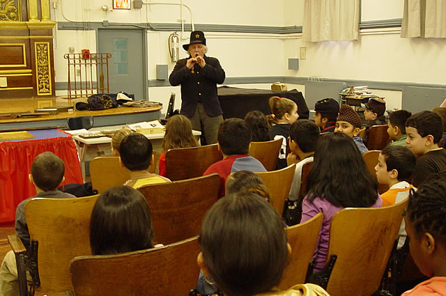 Arthur and his piccolo recorder playing a marching tune.
