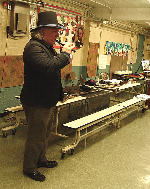 Arthur and his piccolo recorder playing a Civil War marching tune.