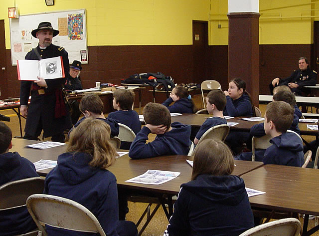 John introduces Johnny Clem to the class.  Johnny was a drummer boy.  He ran away from home to join the Army.  He was only 9 years old.