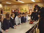 This fire engine runs by steam.  Water is heated in its boiler to create steam. (85kb)