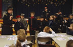 John is signing up his new St. Stans recruits. (69kb)